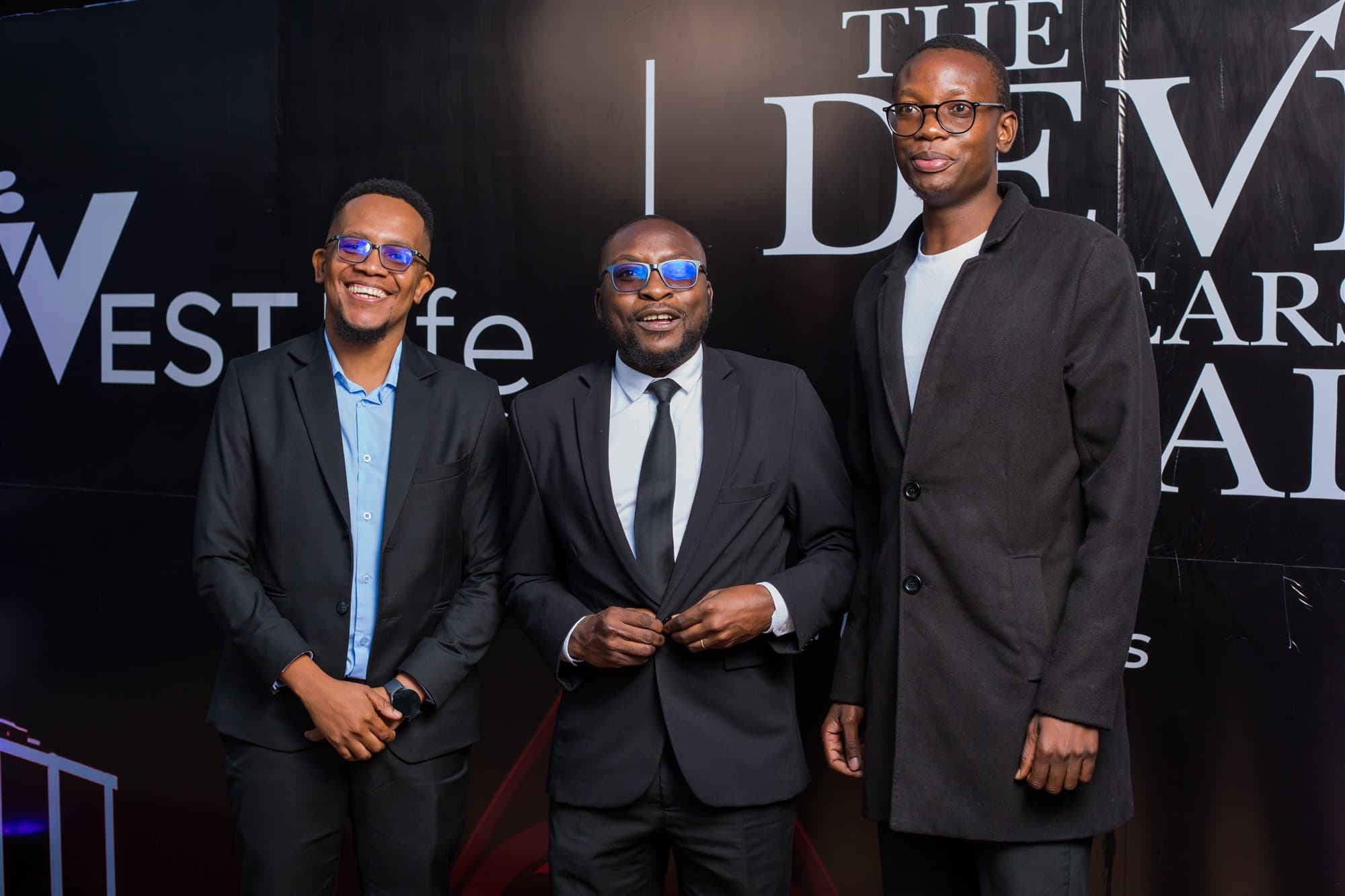 Guests at The Devil Wears Prada 2 event backdrop
